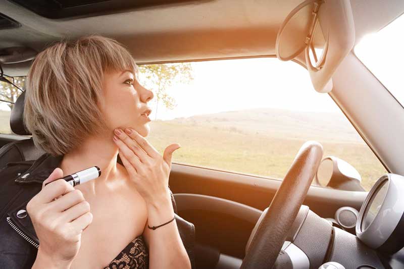 Applying make-up while driving