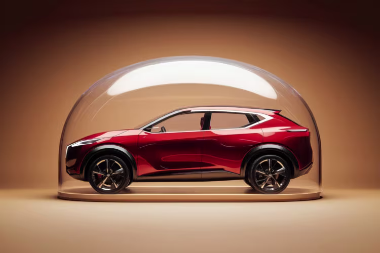 Red SUV encased in a transparent protective dome on a beige background.