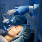 Patient receiving general anesthesia during medical procedure requiring post-surgery transportation planning in Texas