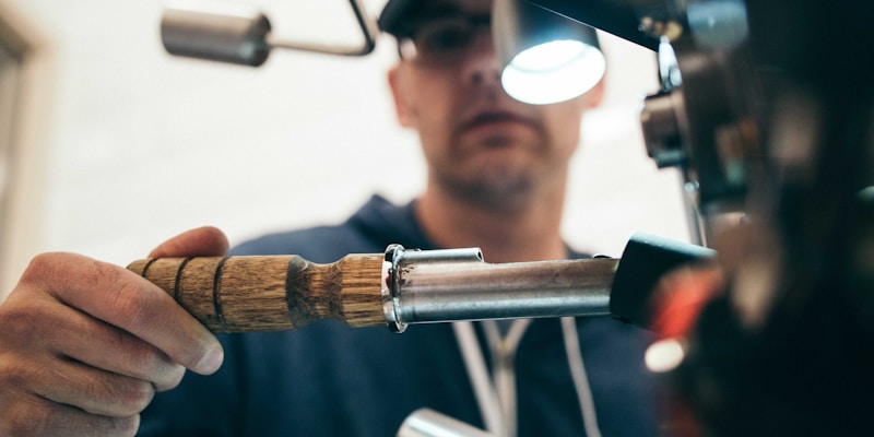Mechanic looking and fixing car engine