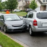 Two drivers and a police officer discuss how automatic emergency braking should have stopped a crash from happening.