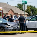 A group of police officers discuss proximate cause Texas injury case with an injured man.